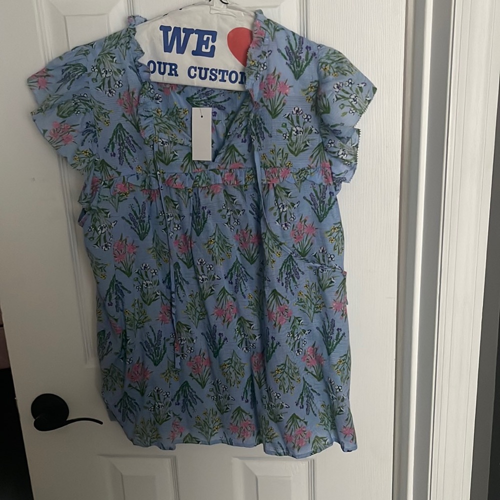Pretty floral ruffle sleeve blouse by the Loft size large